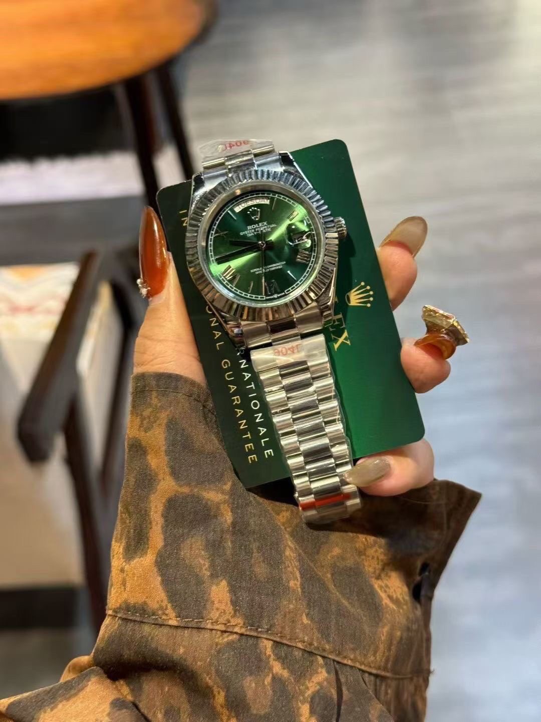 Rolex Green Dial Fluted Bezel Watch — front